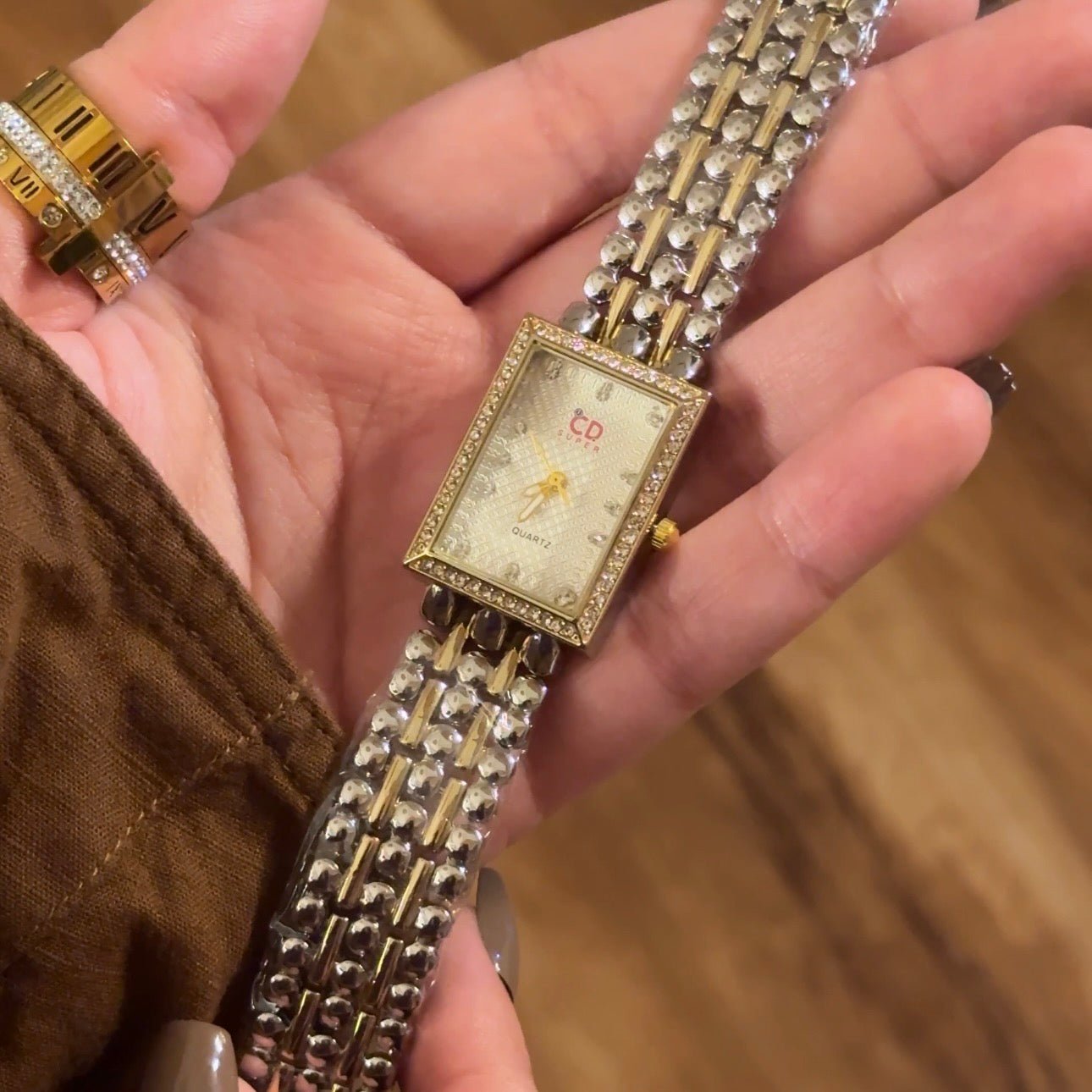 Carée Reloj